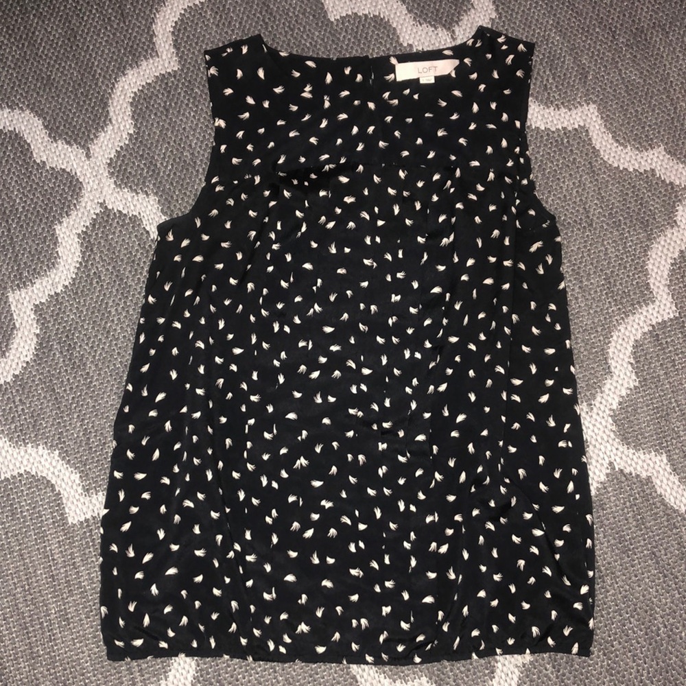 black top with being feathers print
